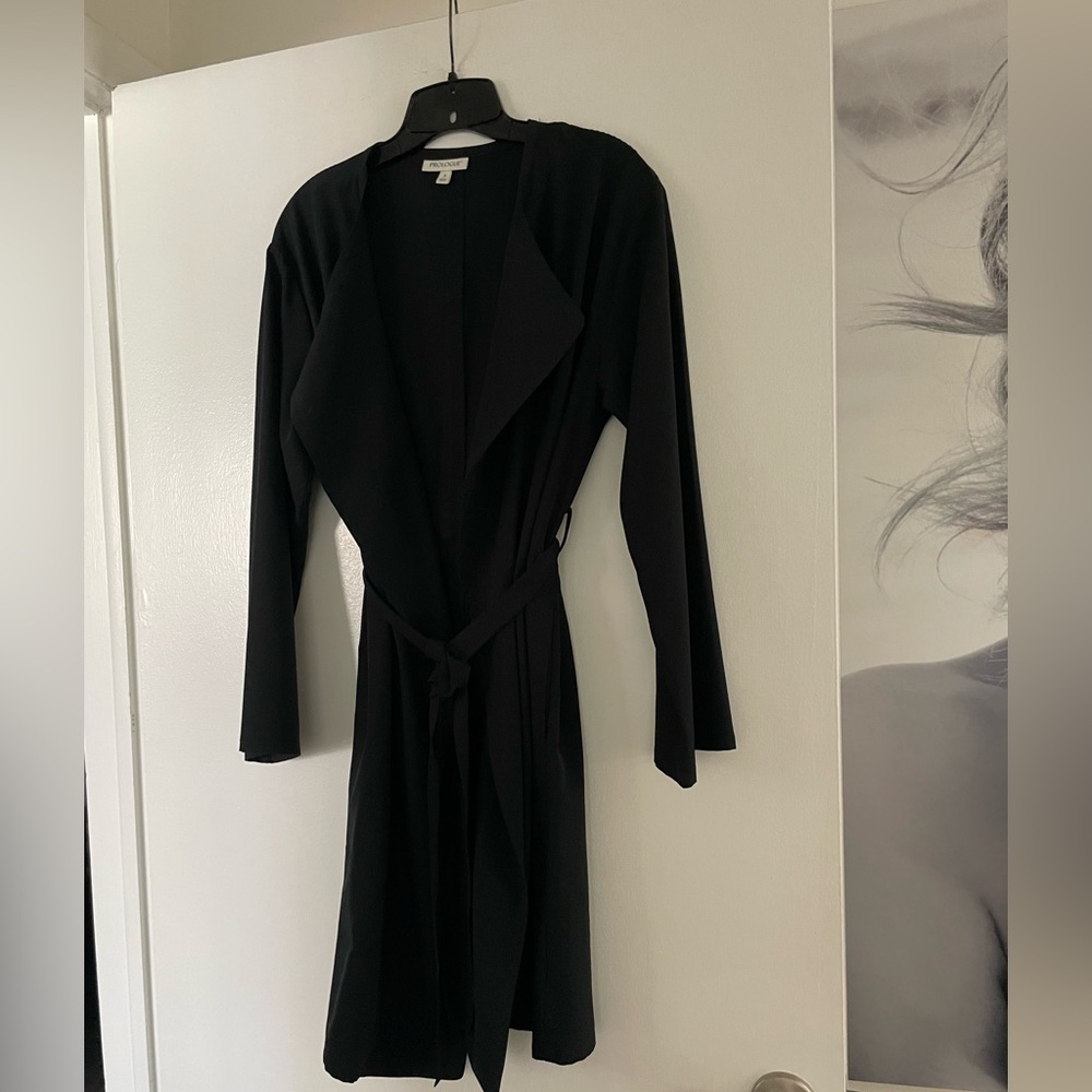 PROLOGUE black nylon and spandex 3/4 belted coat. Size small fits medium.